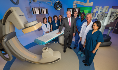 Jim Craigie with the surgical care team in the hybrid OR. Jim’s major gift to the campaign supports the Total Joint program at the Center.