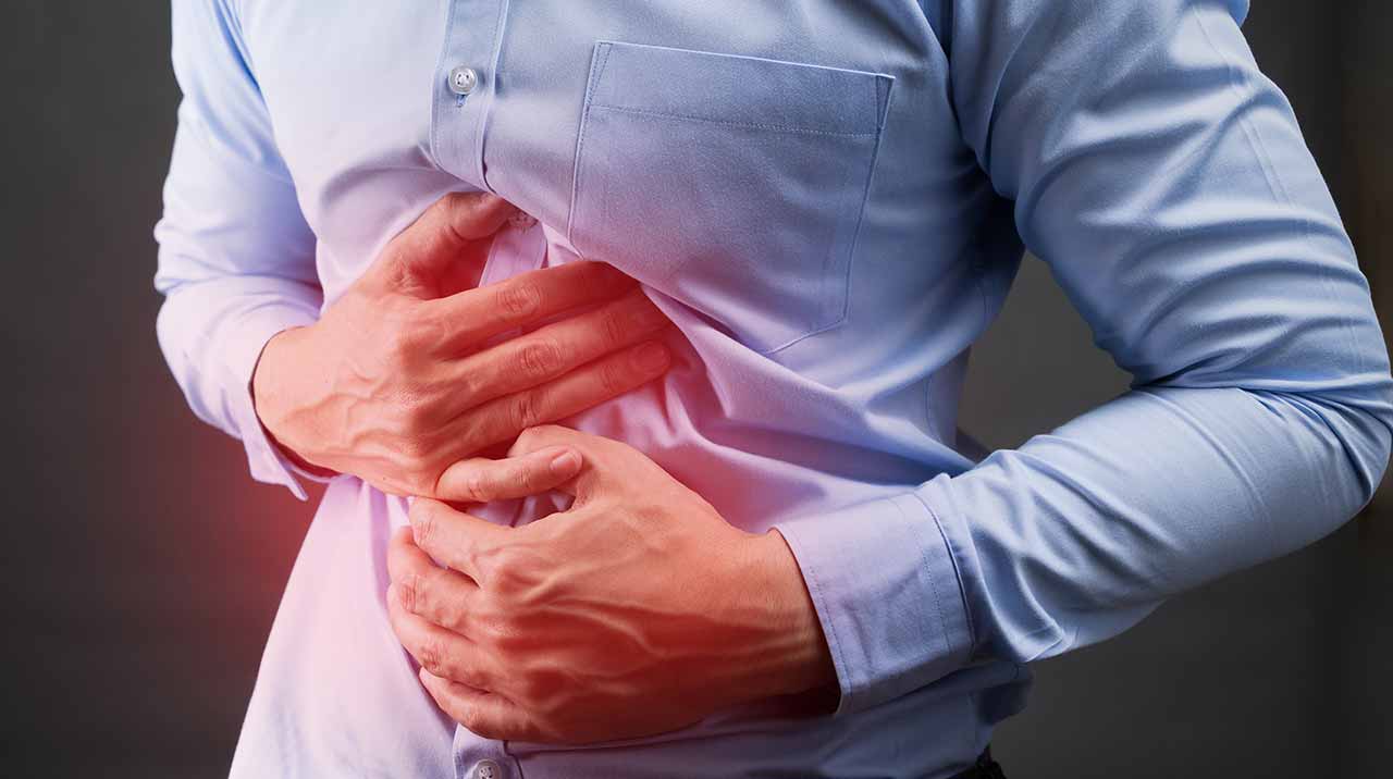 lower stomach pain below belly button