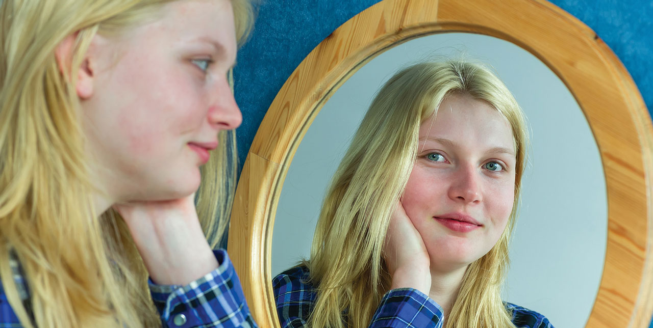 Teen Girl at Mirror