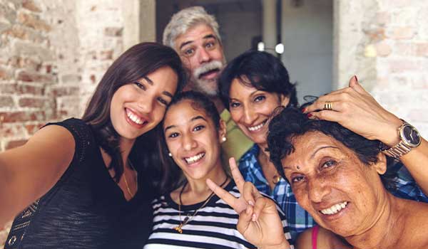 photo of multigenerational family taking a selfie