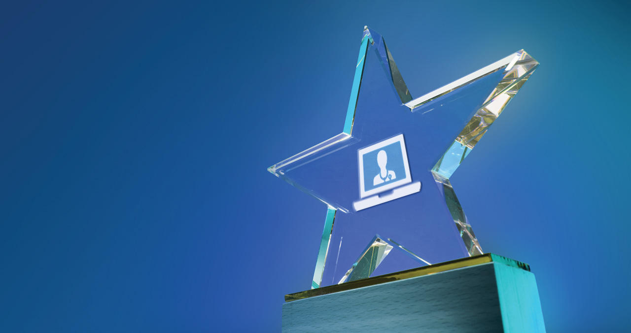 Photo illustration of glass award in the shape of a star with a telemedicine symbol